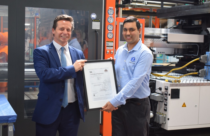 Nigel with Mr Allwyn Lobo, presenting him and Chess Plastics with the IATF Certificate