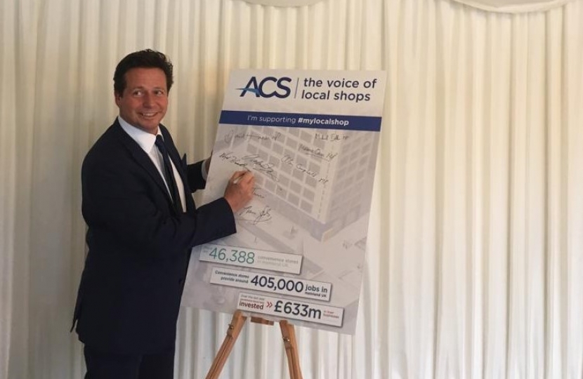 Nigel signing ACS pledge