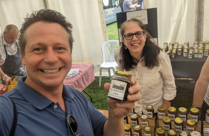 Nigel Huddleston MP holding blueberry jam.