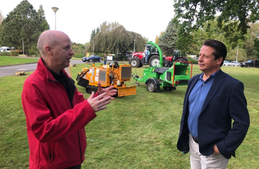 Nigel Huddleston MP presses first apple at Pershore College community day.