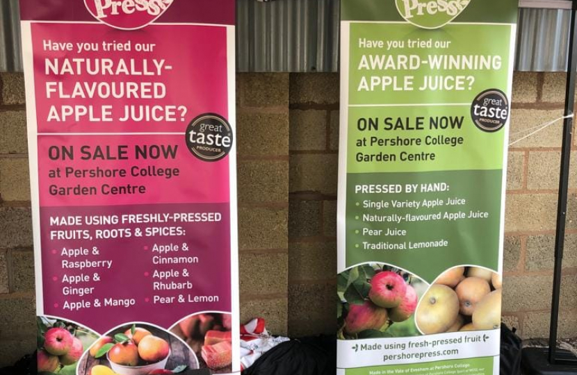 Nigel Huddleston MP presses first apple at Pershore College community day.