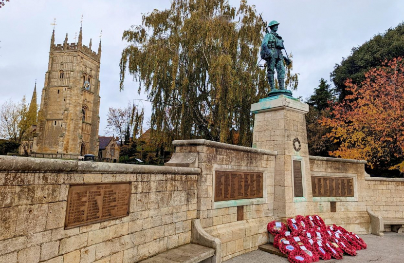 Nigel Huddleston MP pays respects at the War Memorial in Evesham.