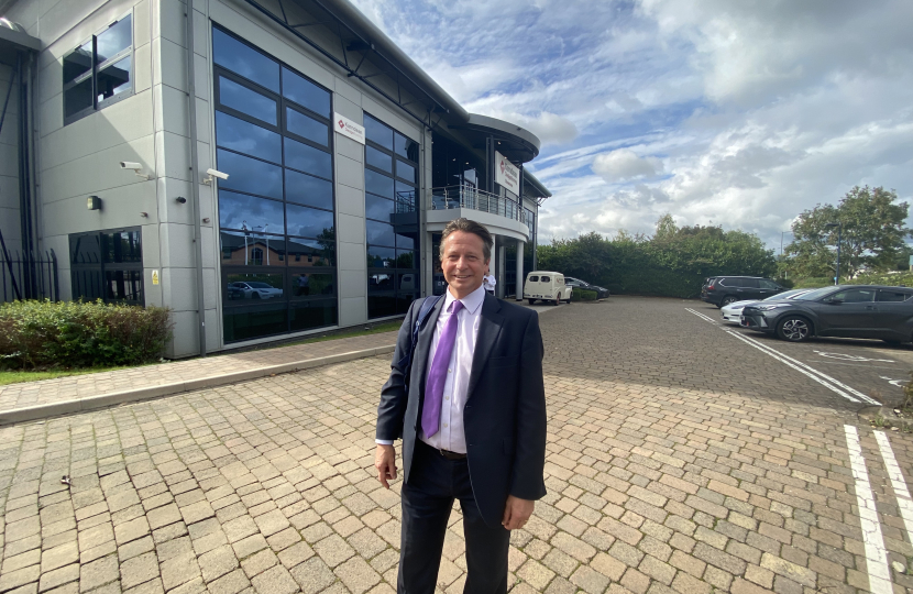 Nigel Huddleston MP outside Karndean Designflooring in Evesham.