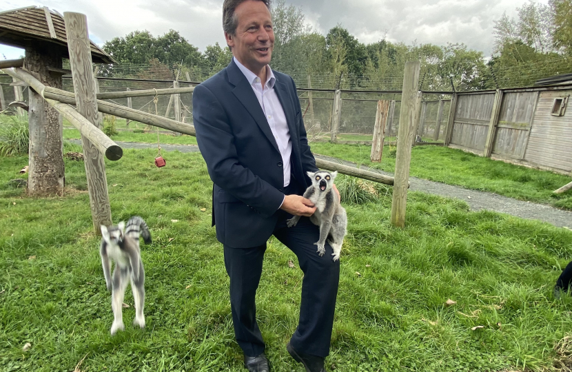 Nigel Huddleston MP feeding lemurs.