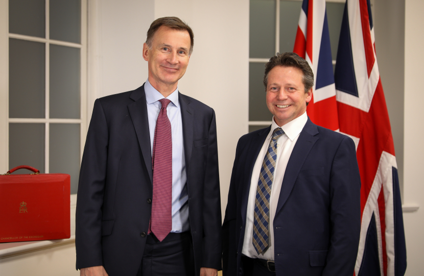 Nigel Huddleston MP with the Chancellor of the Exchequer, Jeremy Hunt MP.