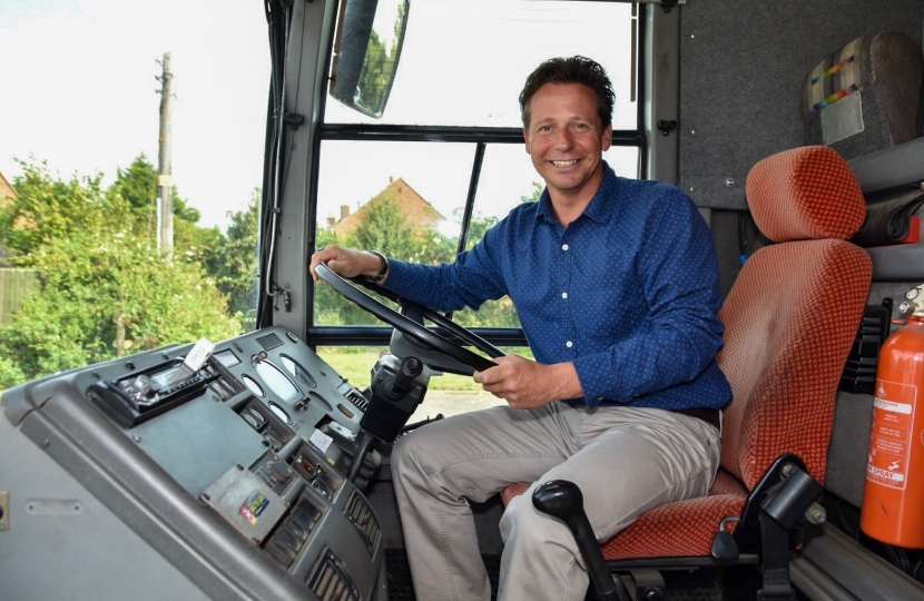 Nigel Huddleston MP on the Youth Bus.